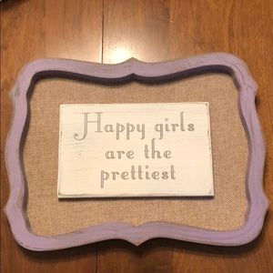 “Happy girls are the prettiest” wall decor